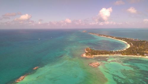 Scenic view of sea against cloudy sky