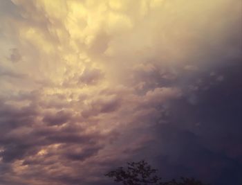 Low angle view of clouds in sky during sunset