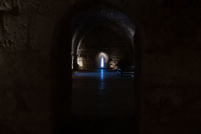 Illuminated tunnel in building