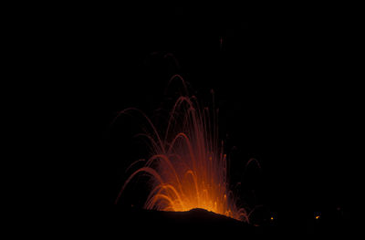 Firework display at night