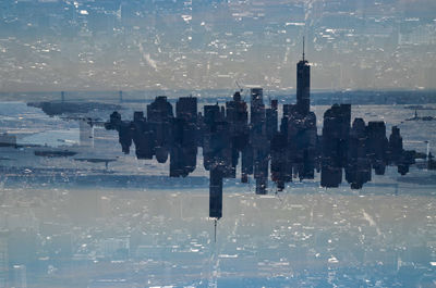 Double exposure image of modern buildings in city