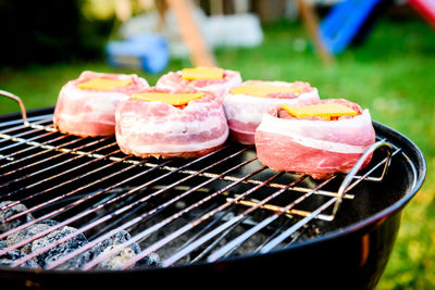 Close-up of meat on barbecue grill