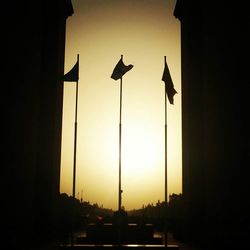 View of street light against sky at sunset