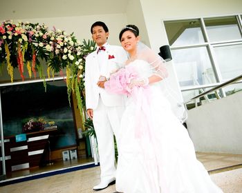 Full length of young couple during wedding ceremony