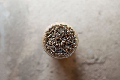 High angle view of coins on table