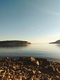 Scenic view of sea against clear sky