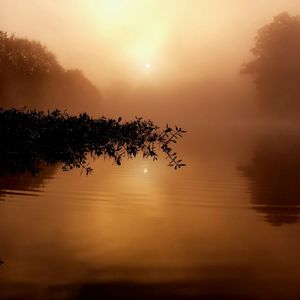 Scenic view of sunset over river