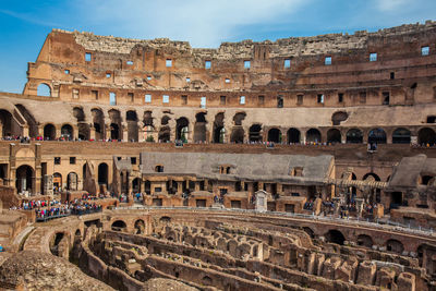 View of the seating areas and the hypogeum of the ancient colosseum in rome