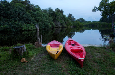 Boat moored on lake shore