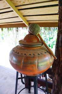 Close-up of lamp hanging on table