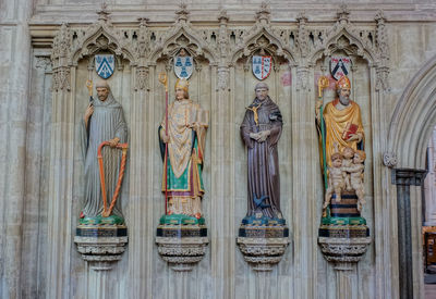 Sculpture of buddha statue in temple outside building