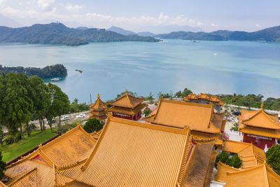 High angle view of buildings on lake