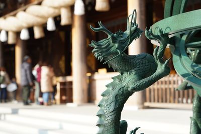 Close-up of statue against blurred background