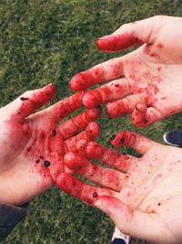 Cropped image of hand holding ice cream