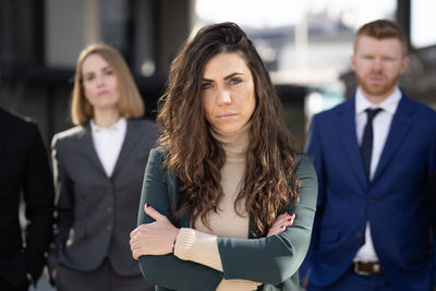 Portrait of business colleagues standing in office