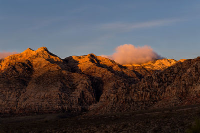 Scenic view of rocky mountains against sky