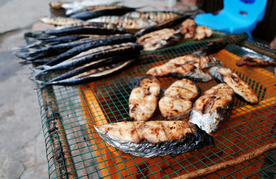 Close-up of meat on barbecue grill