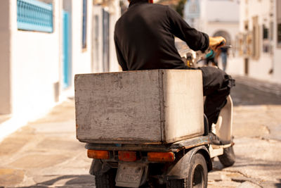 Rear view of man standing on street