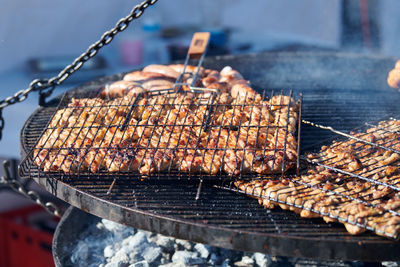 Meat cooking on barbecue grill