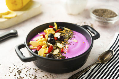 Healthy breakfast. pink smoothie bowl.