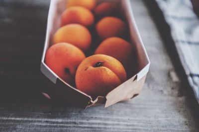 Close-up of oranges on table
