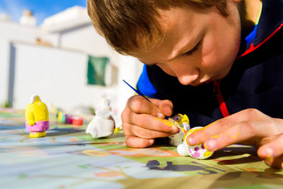 Close-up of man working on table