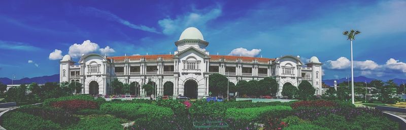 Building against cloudy sky