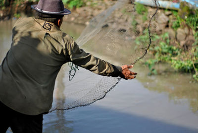 People, river, fish, net