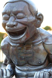 Close-up of buddha statue in temple