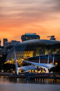 Illuminated city at waterfront