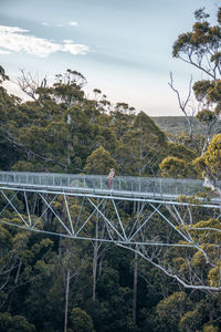 Bridge over river against sky