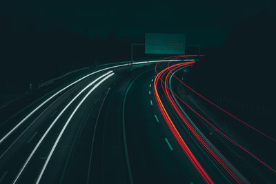 High angle view of light trails on road