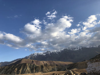 Scenic view of snowcapped mountains against sky