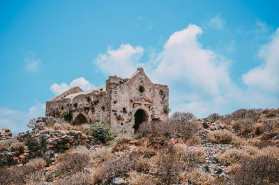 Low angle view of historical building against sky