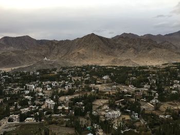 High angle view of buildings in city against sky