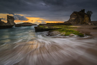 Scenic view of sea against sky during sunset