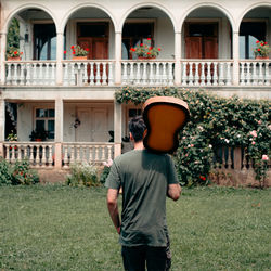 Rear view of man standing in park