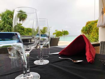 Empty chairs and table at restaurant
