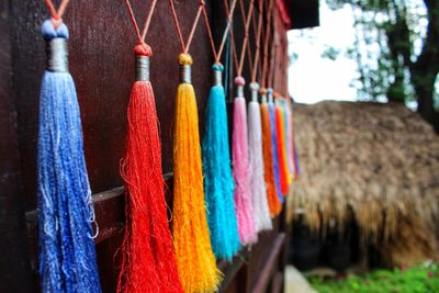 Close-up of multi colored decoration hanging at market stall