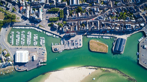 High angle view of residential district by sea