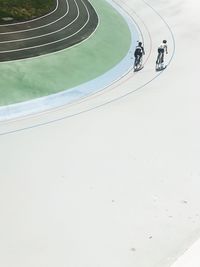 Bicycle leaning against wall