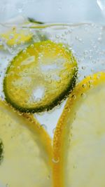 Close-up of lemon slice in glass