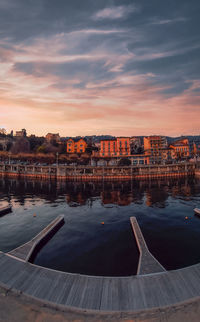 High angle view of city at sunset