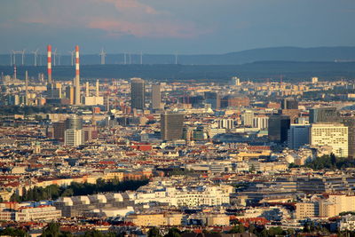 High angle view of buildings in city against sky