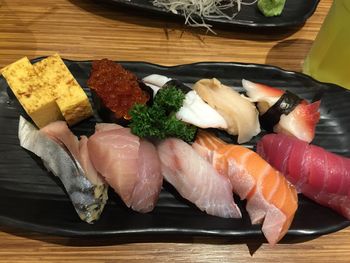Close-up of sushi served on table