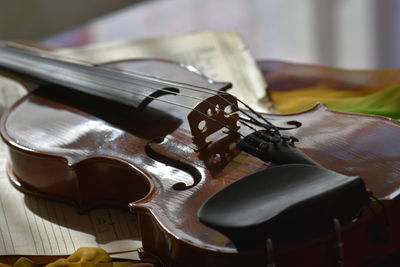 Close-up of violin on table