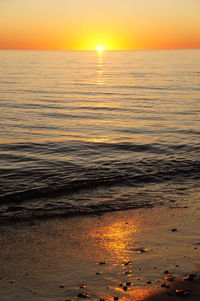 Scenic view of sea at sunset