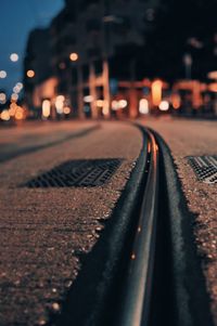 Surface level of railroad tracks at night