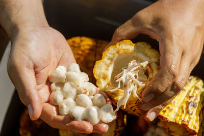 Close-up of hand holding ice cream