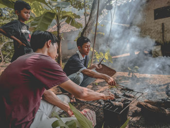 Group of people on barbecue grill